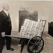 Man with a cart full of money to pay for the family law appeal
